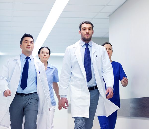 group-of-medics-walking-along-hospital-P92EJ7V-1.jpg group-of-medics-walking-along-hospital-P92EJ7V-1.jpg